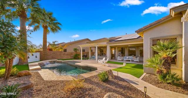 view of swimming pool with outdoor lounge area, a patio, a fenced backyard, and a pergola