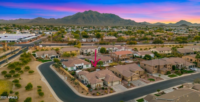 bird's eye view featuring a mountain view and a residential view