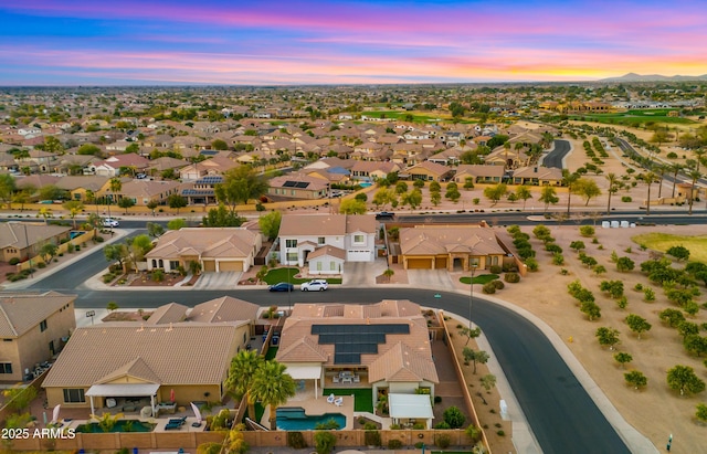 aerial view at dusk with a residential view