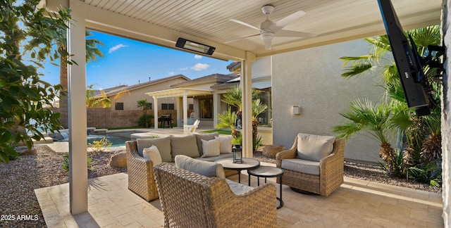 view of patio / terrace with ceiling fan, a fenced backyard, a fenced in pool, and an outdoor hangout area