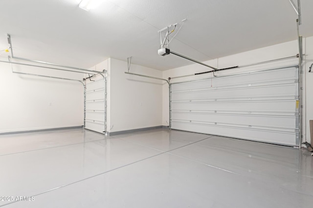 3940 Rolling Stock Way, Wickenburg, AZ 85390 - garage with a garage door opener and baseboards
