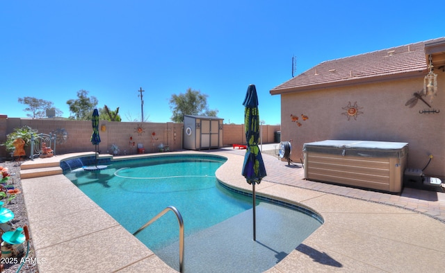 view of swimming pool with a hot tub and a patio