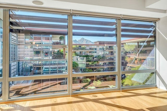 interior space featuring a view of city and a mountain view