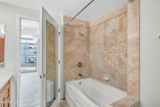 bathroom with vanity and shower / tub combination