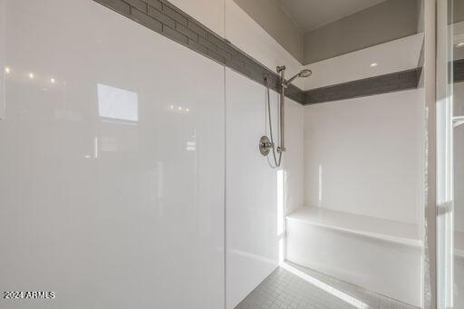 bathroom with tile flooring