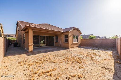 back of house with a patio area