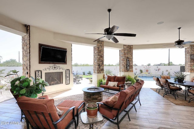 view of patio / terrace with an outdoor hangout area and ceiling fan