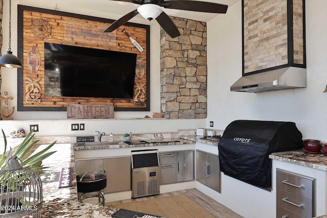 view of patio / terrace featuring grilling area, sink, and ceiling fan