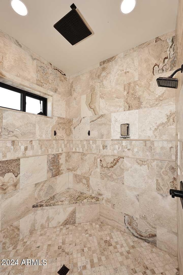 bathroom featuring tiled shower