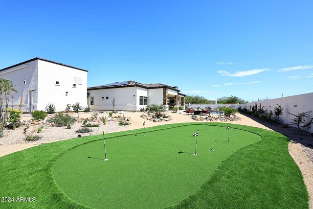 view of home's community featuring a patio