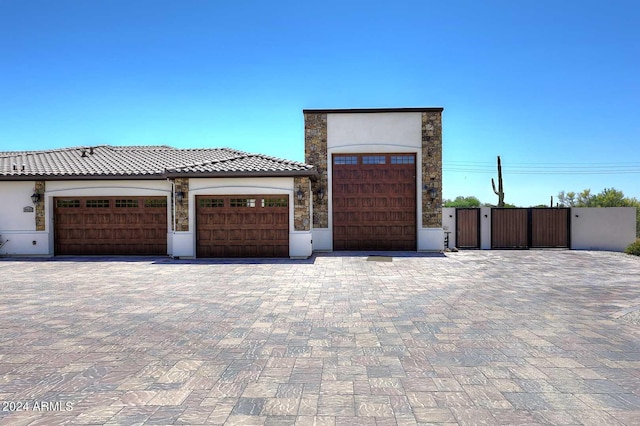 view of front of property with a garage