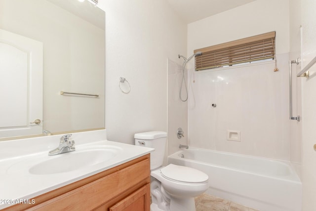 bathroom with toilet, vanity, and shower / bath combination