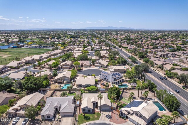 aerial view with a mountain view and a residential view