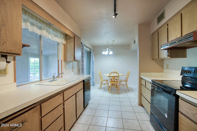 kitchen with sink, black appliances, a notable chandelier, decorative light fixtures, and track lighting