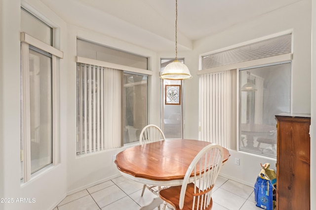 dining space with light tile patterned floors