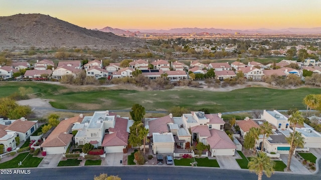 aerial view at dusk with a mountain view