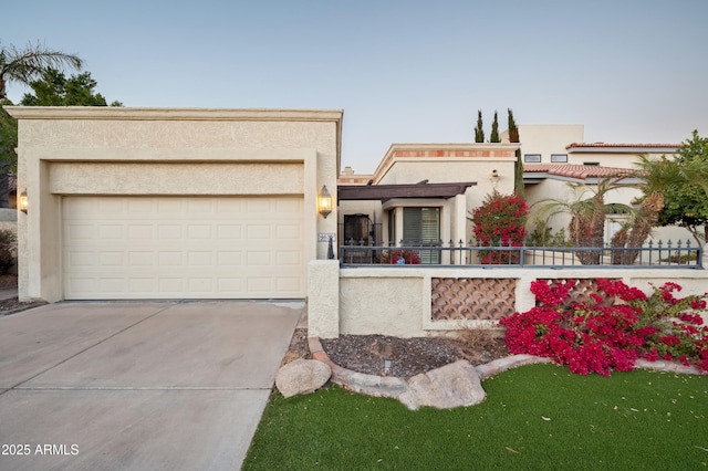 view of front of property with a garage