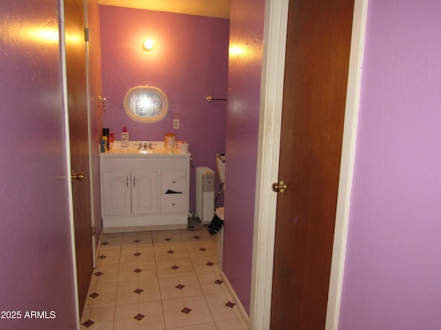 2045 S 6th Ave, Phoenix, AZ 85003 - bathroom featuring vanity, tile patterned floors, and radiator