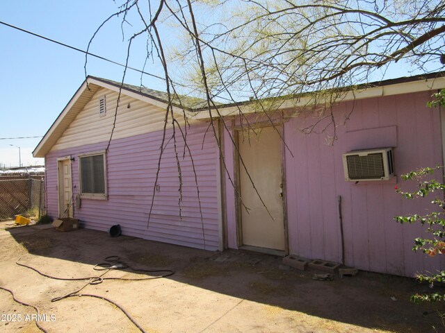 2045 S 6th Ave, Phoenix, AZ 85003 - view of home's exterior featuring a wall mounted air conditioner