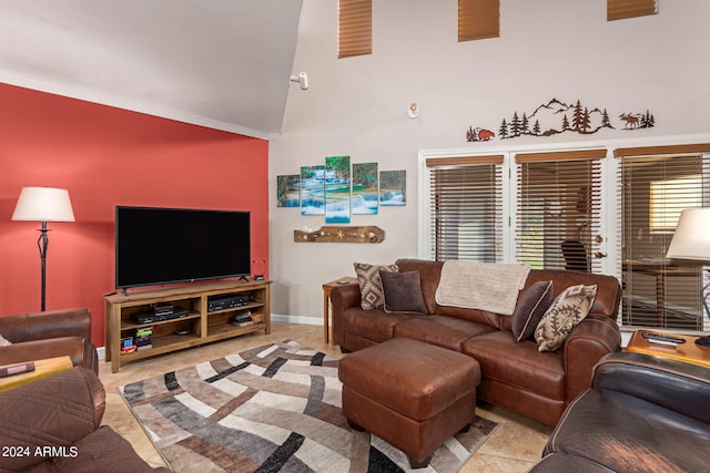 tiled living room featuring high vaulted ceiling