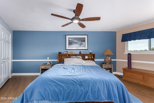 bedroom featuring ceiling fan and hardwood / wood-style floors