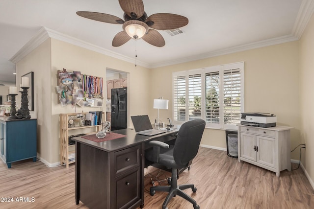 office featuring light wood-type flooring, ceiling fan, and crown molding