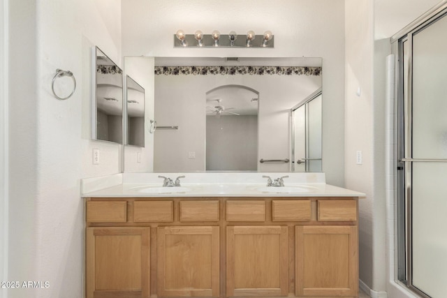 6372 S Callaway Dr, Chandler, AZ 85249 - full bathroom featuring double vanity, an enclosed shower, a sink, and a ceiling fan