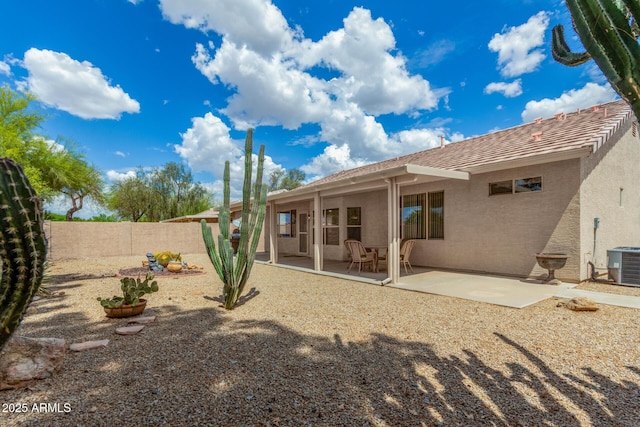 6372 S Callaway Dr, Chandler, AZ 85249 - back of house with central air condition unit, a patio, stucco siding, and fence