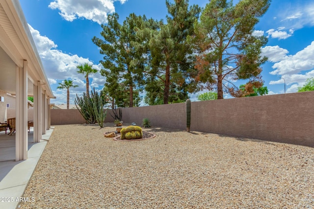 6372 S Callaway Dr, Chandler, AZ 85249 - view of yard featuring a patio area and a fenced backyard