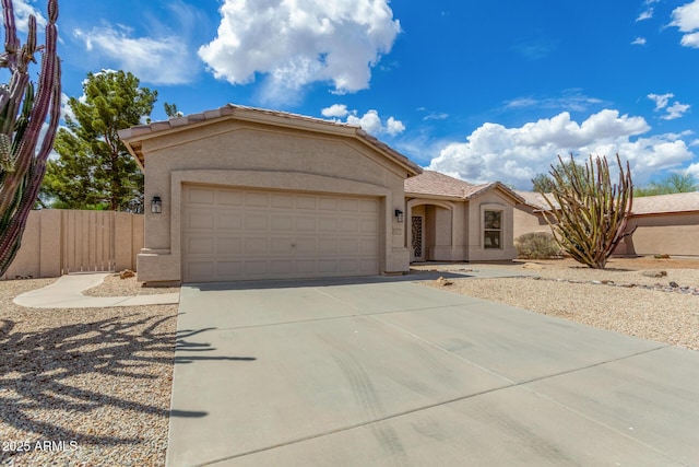 6372 S Callaway Dr, Chandler, AZ 85249 - ranch-style home with driveway, stucco siding, fence, and an attached garage
