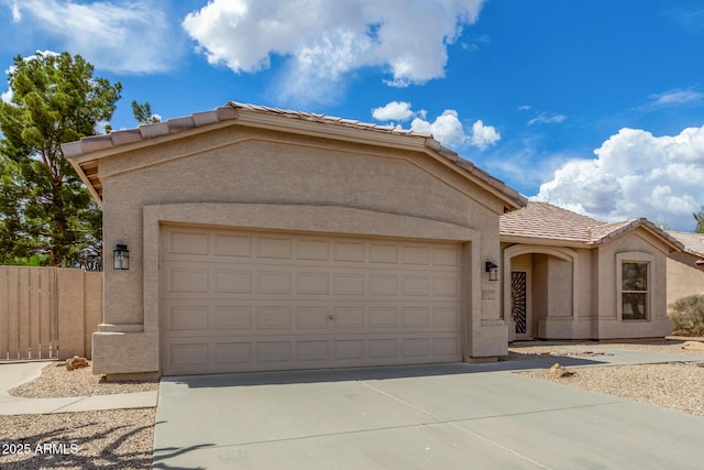6372 S Callaway Dr, Chandler, AZ 85249 - view of front of house with concrete driveway, a garage, and stucco siding