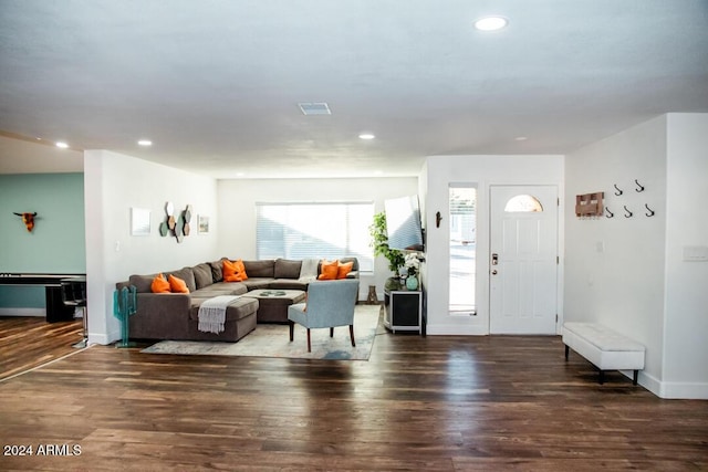 foyer entrance with dark wood-type flooring