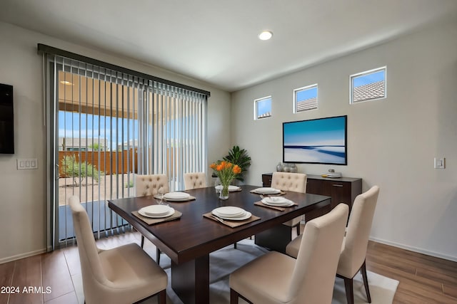 dining area with hardwood / wood-style flooring and a wealth of natural light