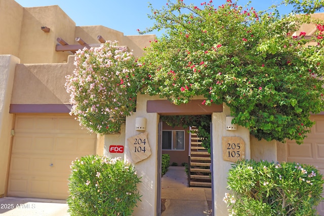 7021 E Earll Dr Unit 204, Scottsdale, AZ 85251 - view of front of property with stucco siding