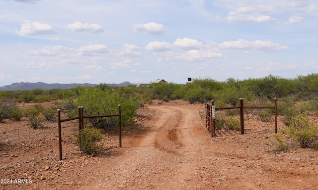 view of road featuring a mountain view and a rural view