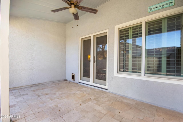 view of patio / terrace featuring ceiling fan