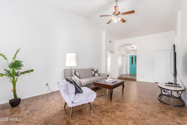 living room with high vaulted ceiling and ceiling fan