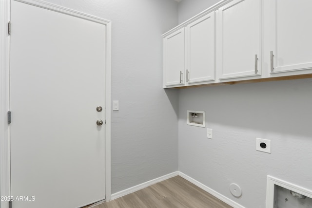 washroom with hookup for an electric dryer, light wood-type flooring, hookup for a washing machine, cabinet space, and hookup for a gas dryer