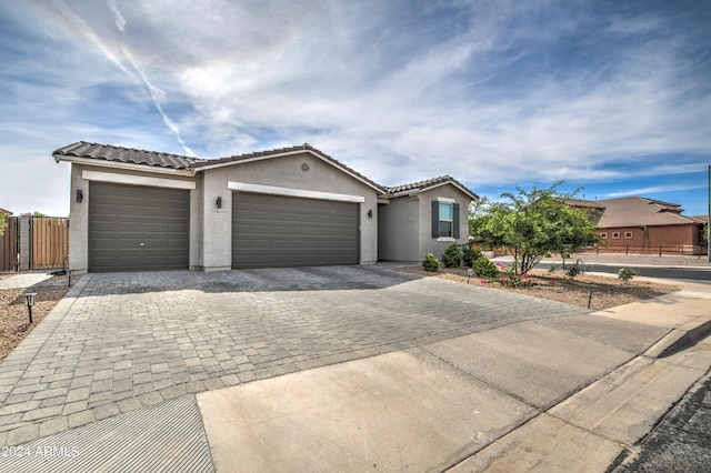 view of front of property with a garage