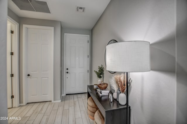 entryway with light hardwood / wood-style flooring