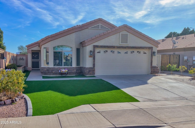 view of front of house with a garage and a front yard