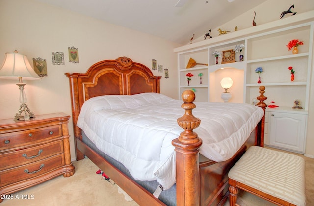 bedroom featuring ceiling fan, light colored carpet, and vaulted ceiling