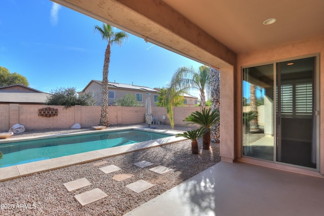 view of pool featuring a patio area