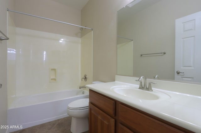 full bathroom featuring vanity, tile patterned flooring, washtub / shower combination, and toilet