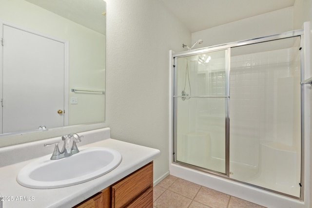 2421 W Romley Rd, Phoenix, AZ 85041 - full bath featuring a shower stall, vanity, and tile patterned floors