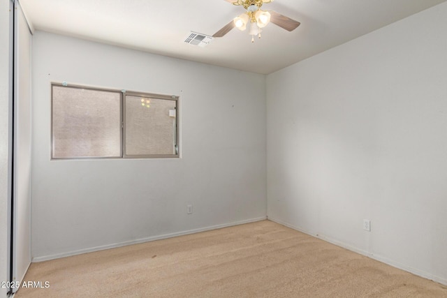 2421 W Romley Rd, Phoenix, AZ 85041 - empty room with carpet, a ceiling fan, and baseboards