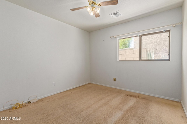 2421 W Romley Rd, Phoenix, AZ 85041 - unfurnished room with carpet, baseboards, and a ceiling fan