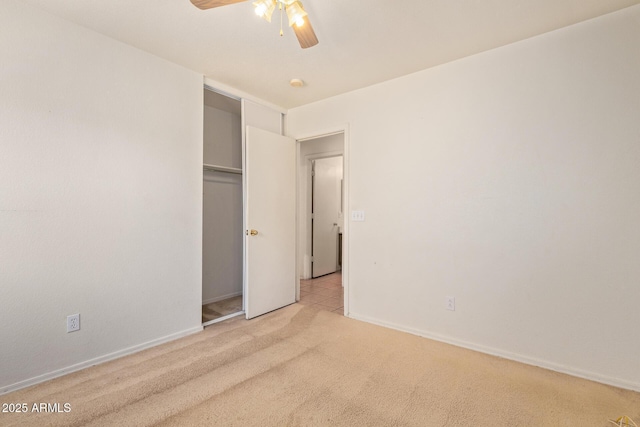 2421 W Romley Rd, Phoenix, AZ 85041 - unfurnished bedroom featuring carpet floors, baseboards, a ceiling fan, and a closet