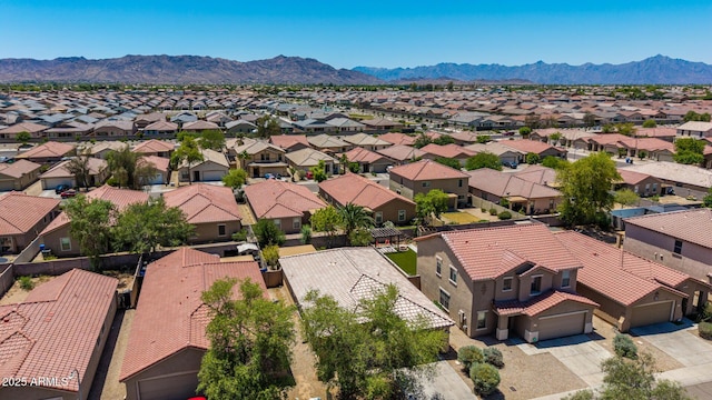 2421 W Romley Rd, Phoenix, AZ 85041 - aerial perspective of suburban area with a mountainous background
