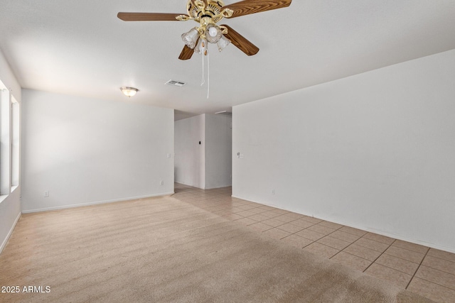 2421 W Romley Rd, Phoenix, AZ 85041 - empty room with a ceiling fan, tile patterned floors, and baseboards